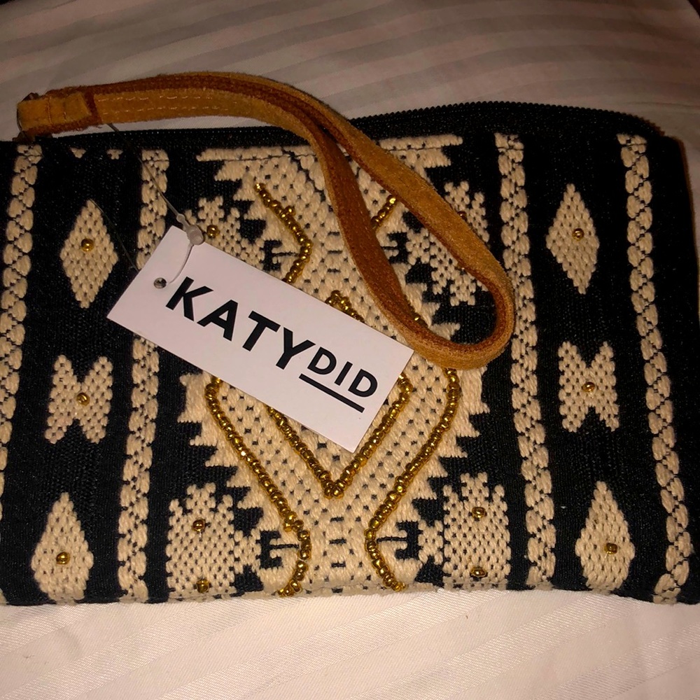 Katy Did Cosmetic purse, with leather strap